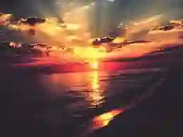 sun appear colored at the time of sunrise and sunset
